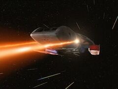 A runabout firing two forward phasers.